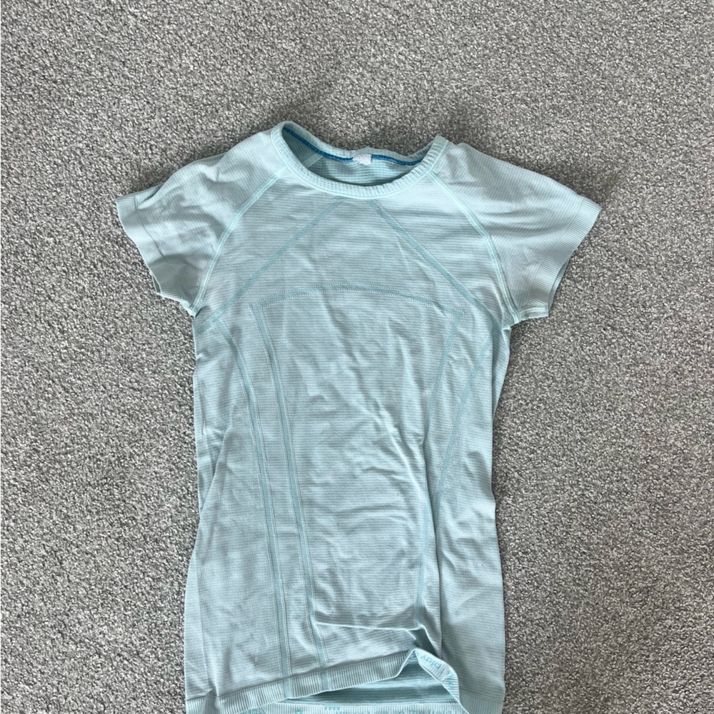 Aviva (kids Lululemon) teal color, black with white dots, and darker blue color.
